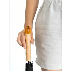 Jurassic Park Regenschirm mit Bernsteinfossil-Griff