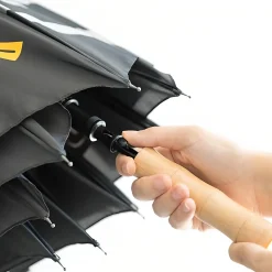 Jurassic Park Regenschirm mit Bernsteinfossil-Griff